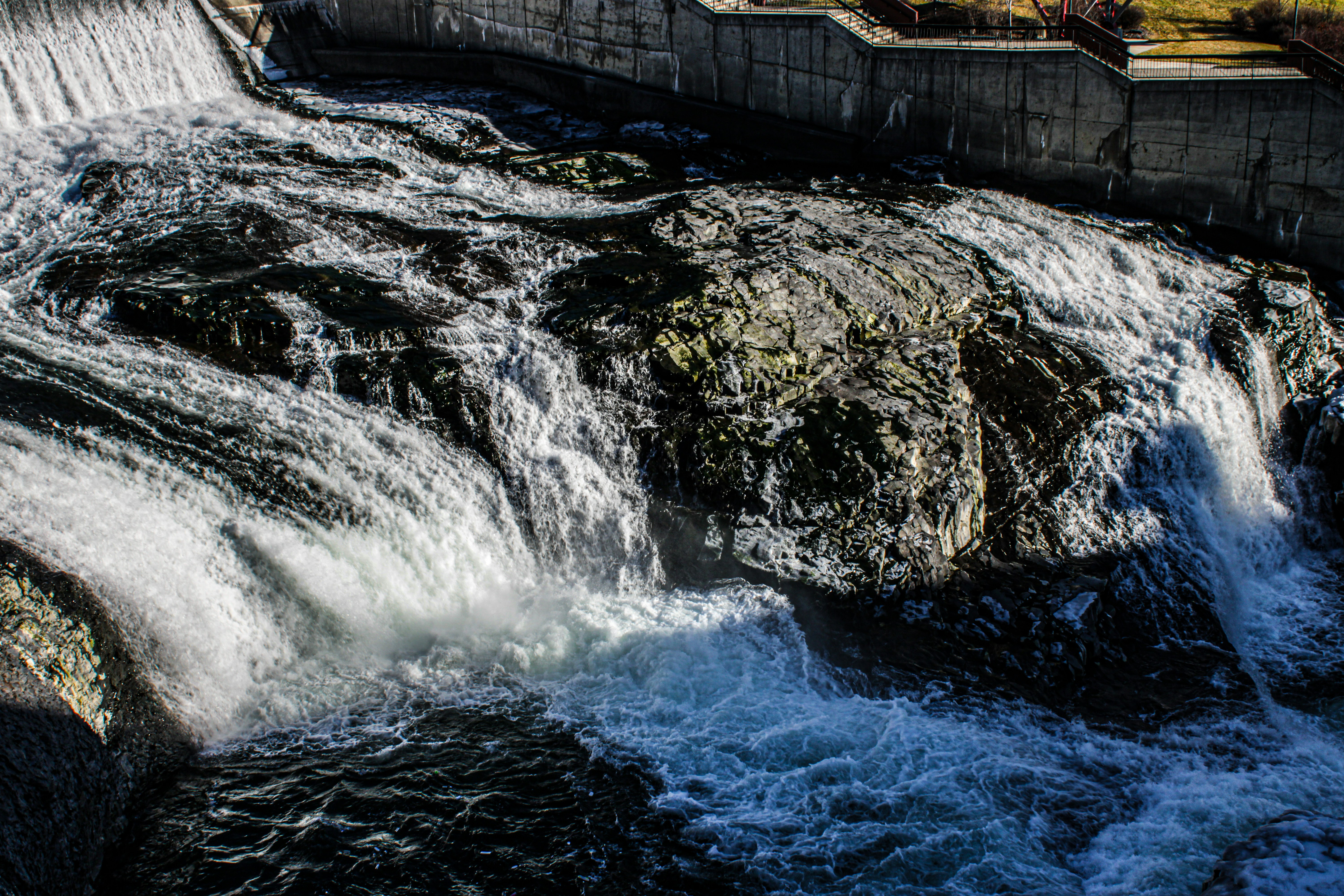 Water cascades over rocks in a beautiful waterfall.