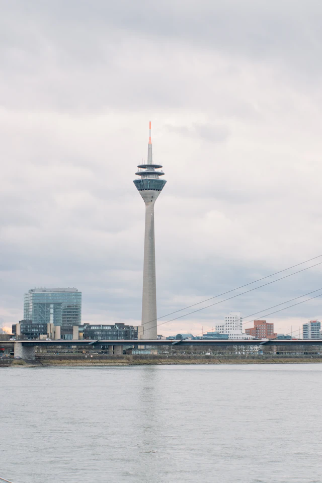 Düsseldorf's Rheinturm rising above the Rhine waterfront