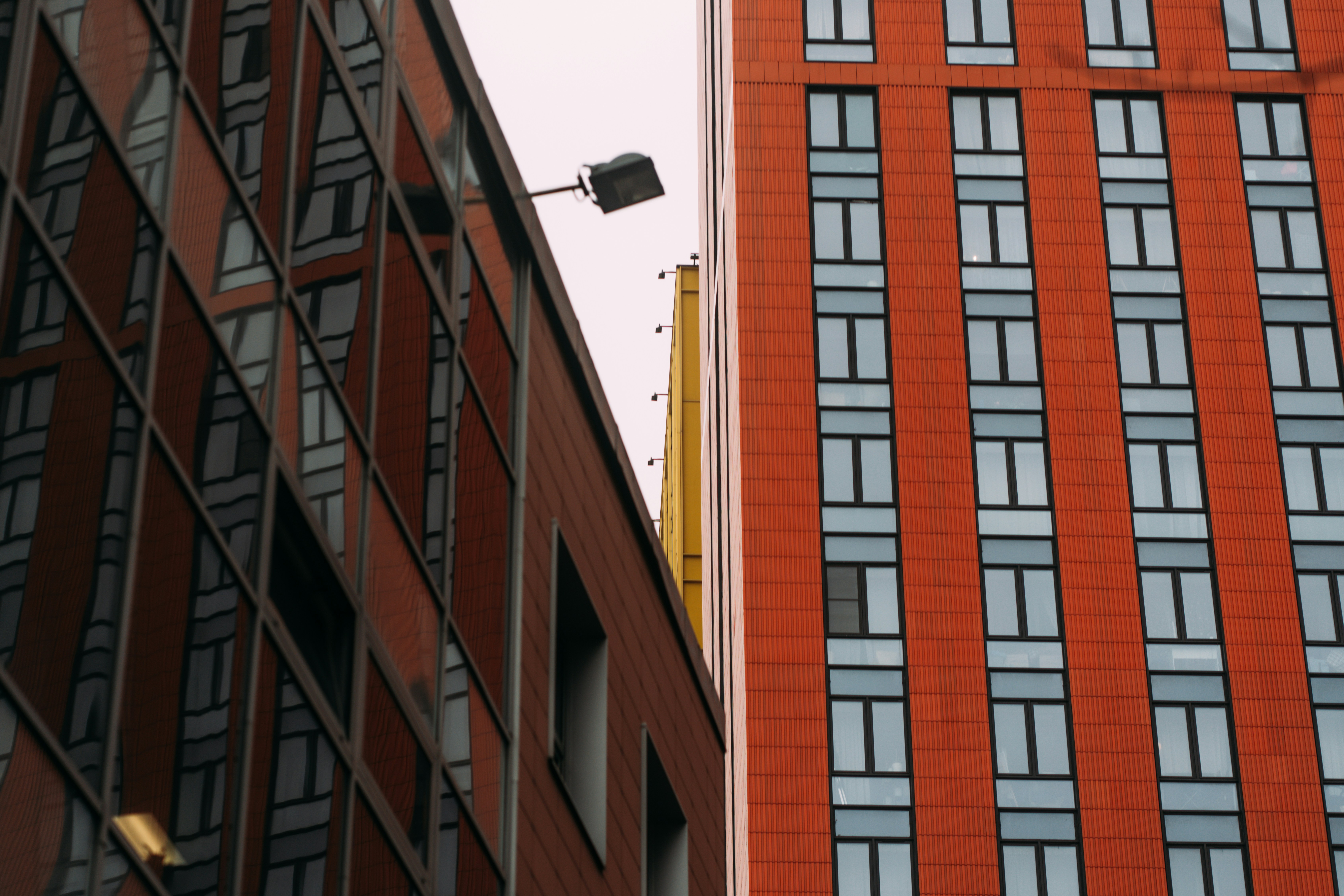 Modern buildings with windows and reflections.