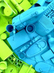 An assortment of objects are painted in neon colors.