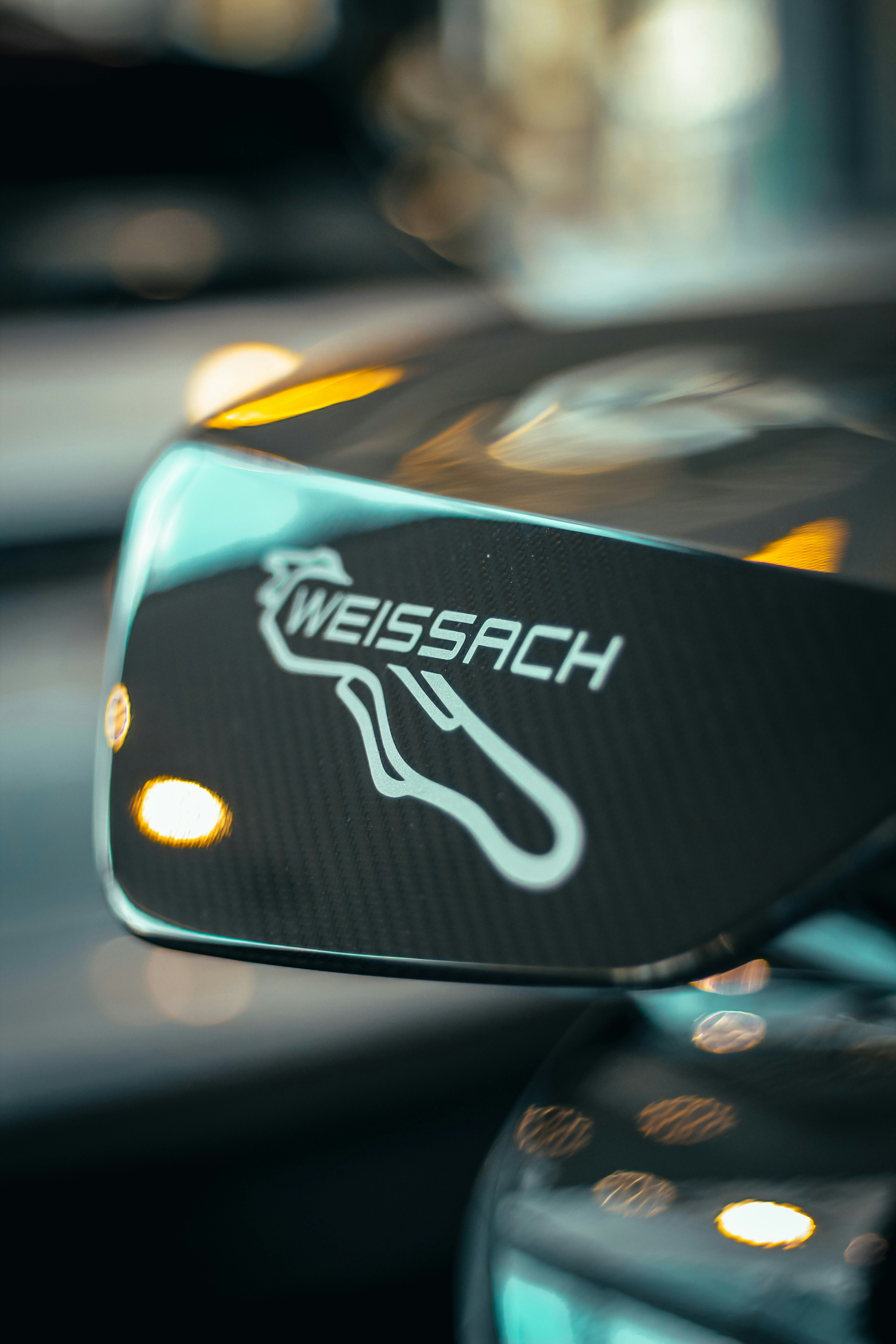 A close-up of a weissach spoiler.