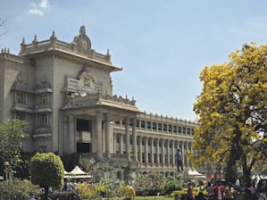 The vidhana soudha government building stands tall.