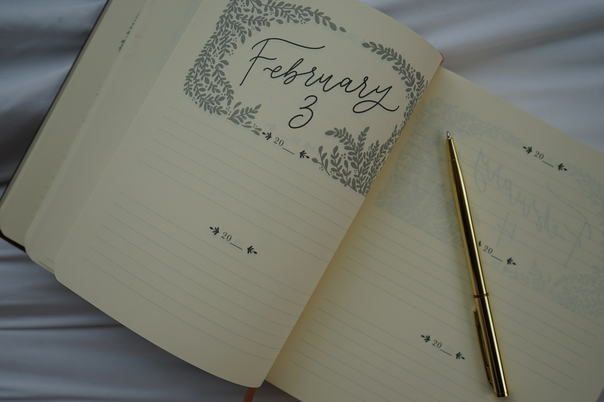 A journal is open to february 3, ready to write.