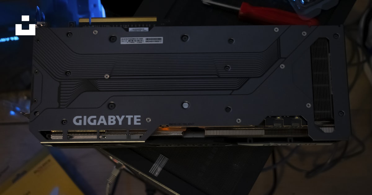 A gigabyte graphics card's backplate is visible. photo – Free ...