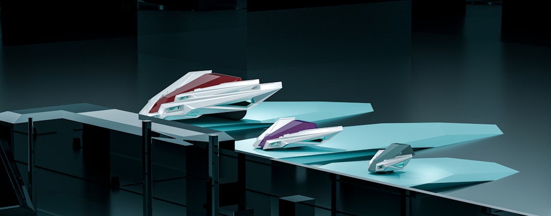 Three futuristic vehicles on display.,