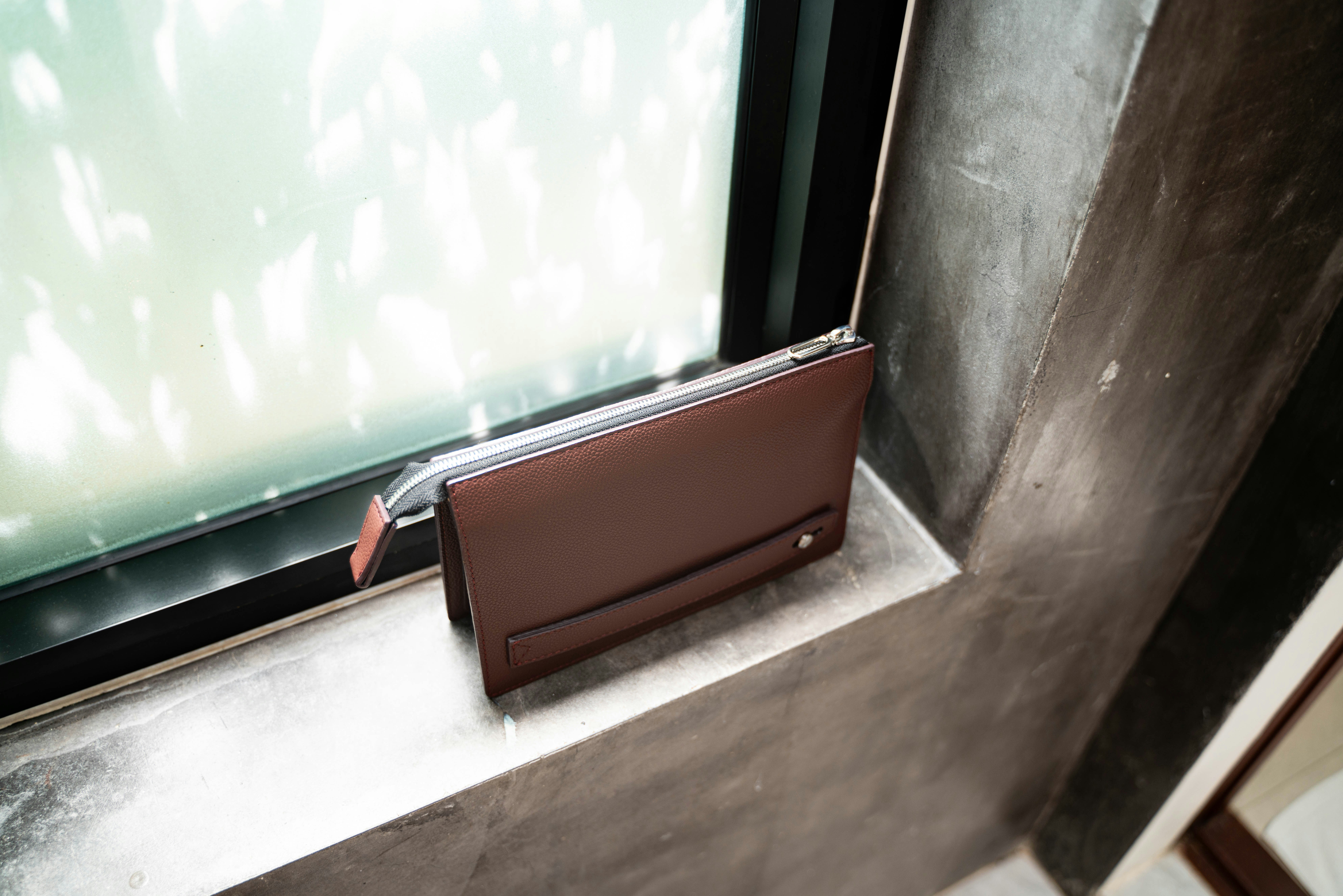 suede clutch bag
