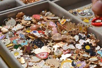 A box overflowing with colorful charms.