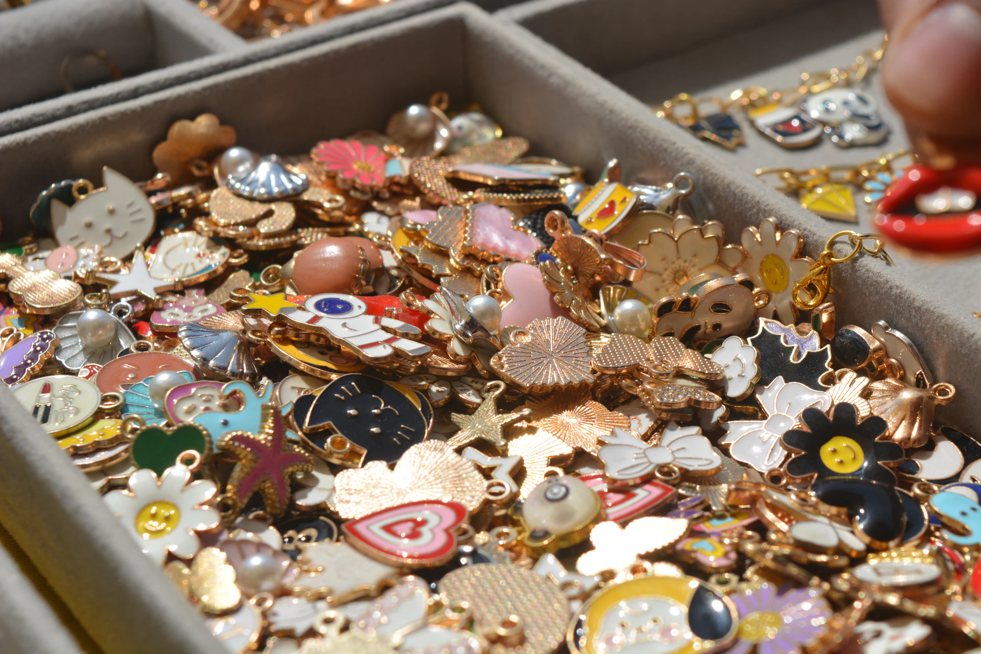 A box overflowing with colorful charms.