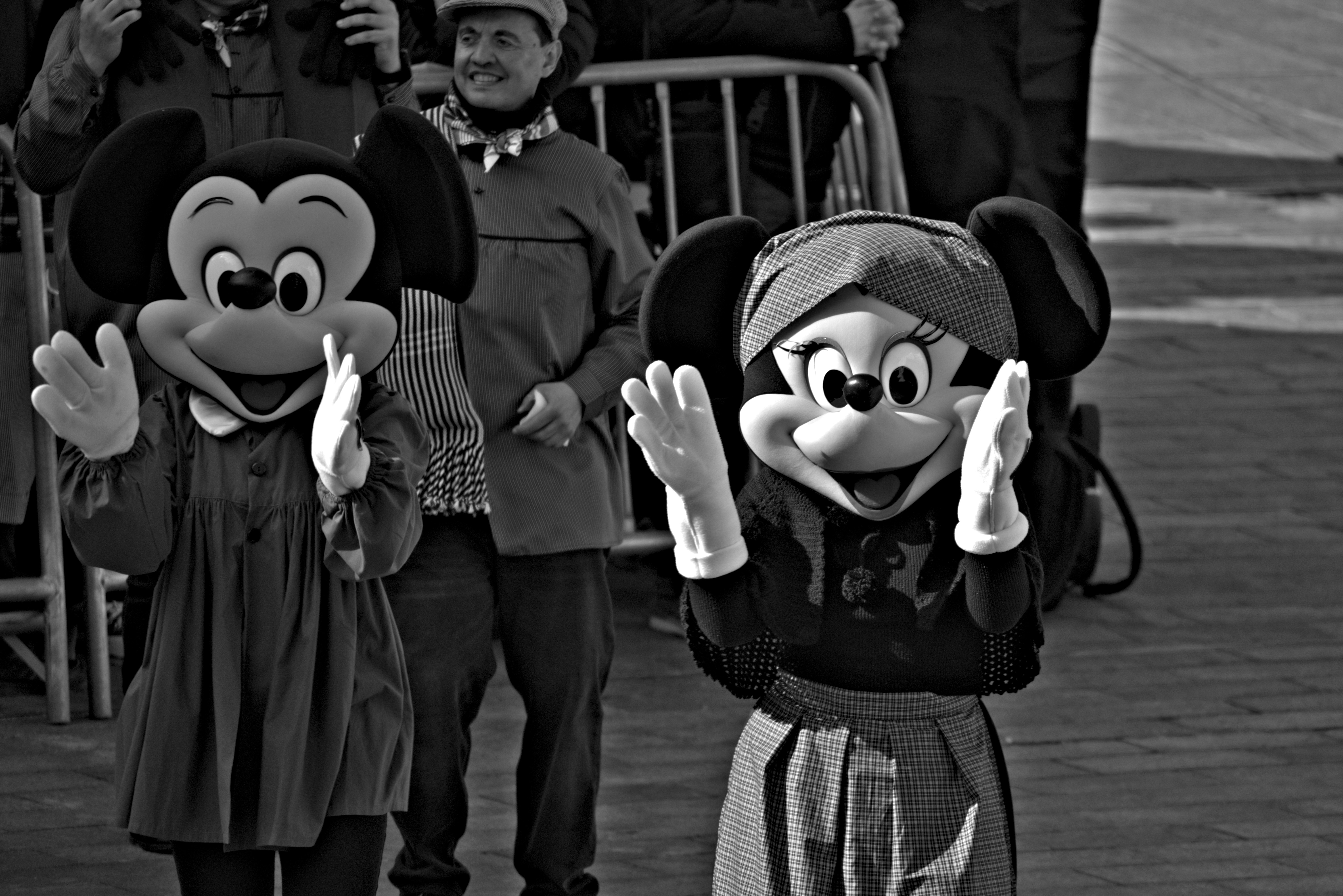 Minnie mouse characters wave at the crowd. photo – Free White Image on ...