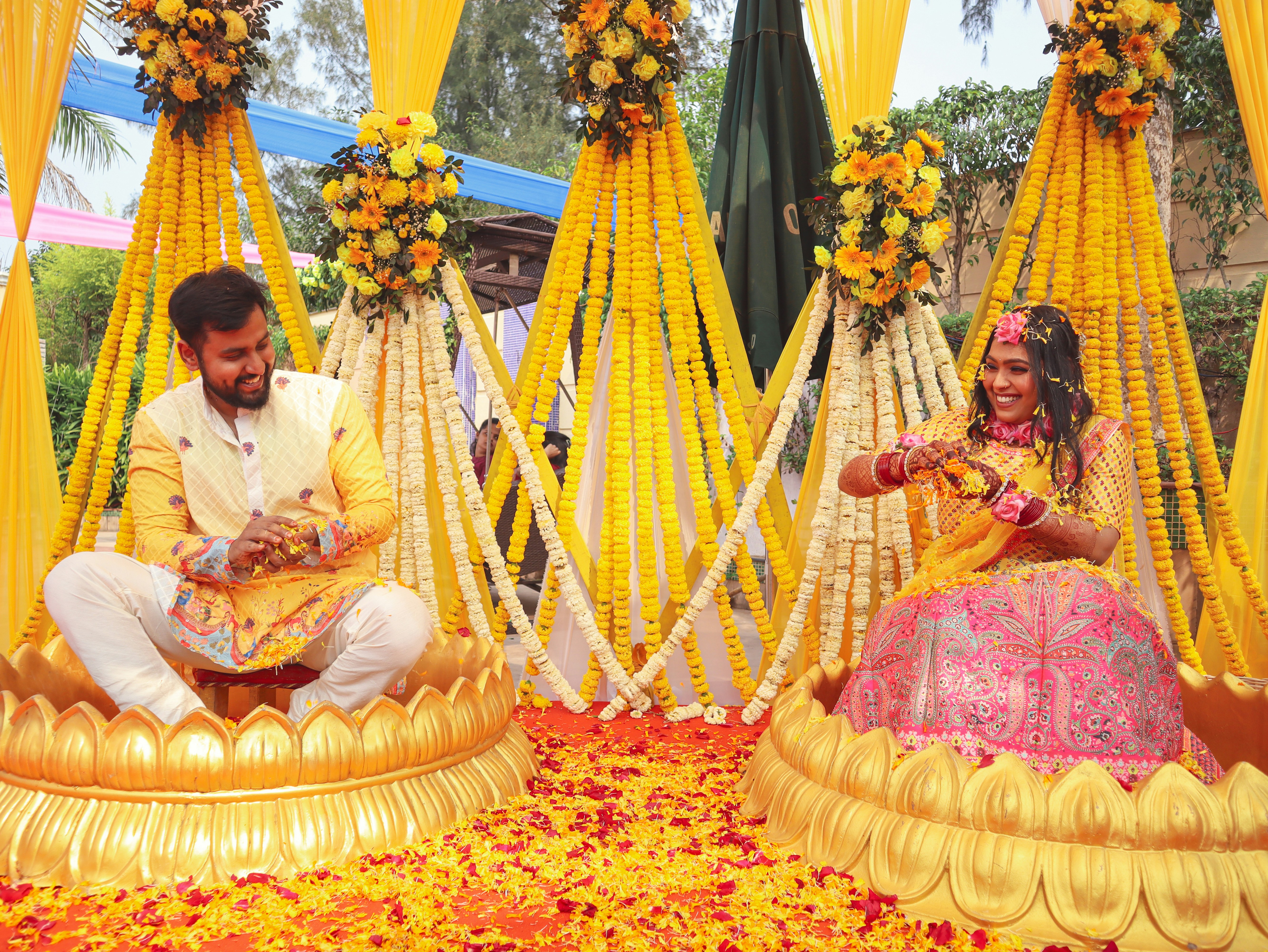 Couple enjoys a colorful pre-wedding ceremony.