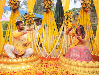 Couple celebrates a colorful wedding ceremony together.