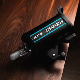 A godox qs600ii studio flash.