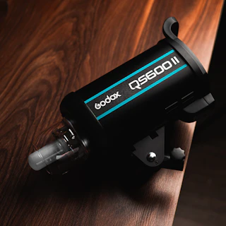 A godox qs600ii studio flash.