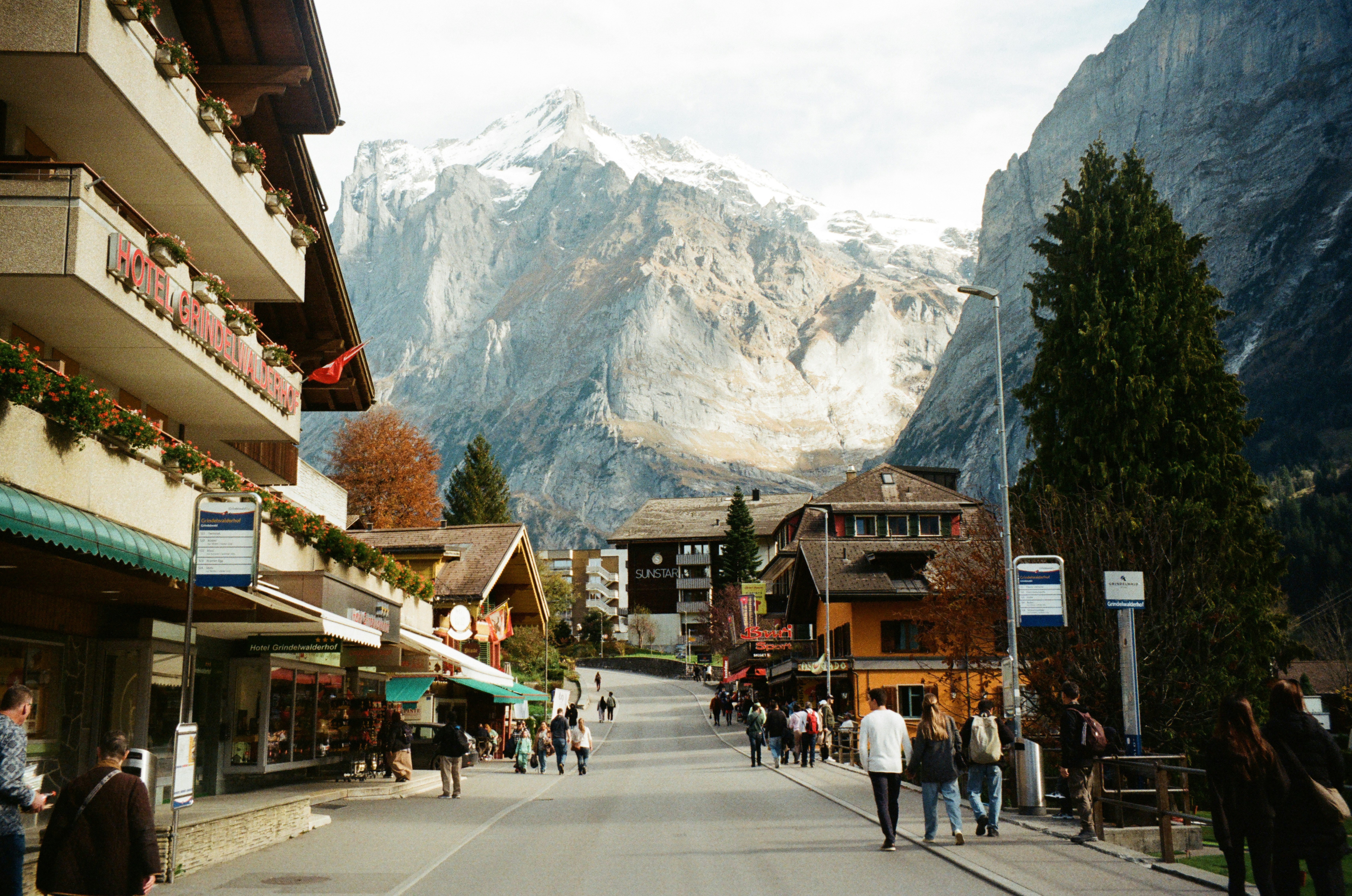 A village street with mountain backdrop.