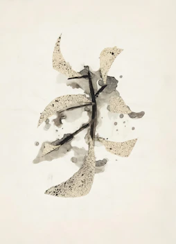 Abstract ink wash painting of a branch with leaves