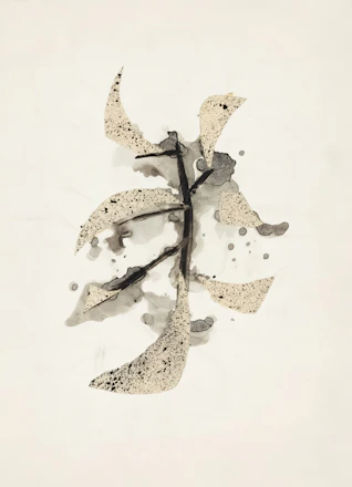 Abstract ink wash painting of a branch with leaves