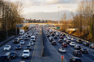 Highway is experiencing heavy traffic with many cars.