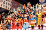 A collection of vintage superhero toys.