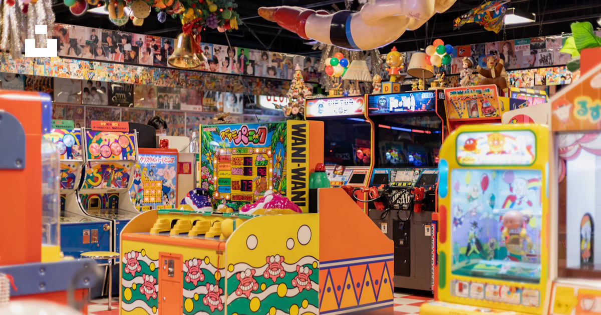 Inside a vibrant, colorful arcade filled with games. photo – Free Japan ...
