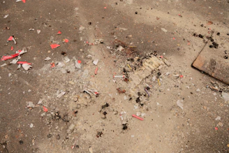 Debris and remnants are scattered across the floor.