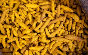 Dried turmeric root is shown.