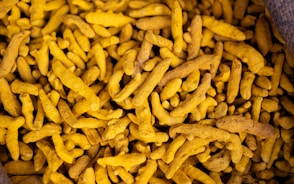 Dried turmeric root is shown.
