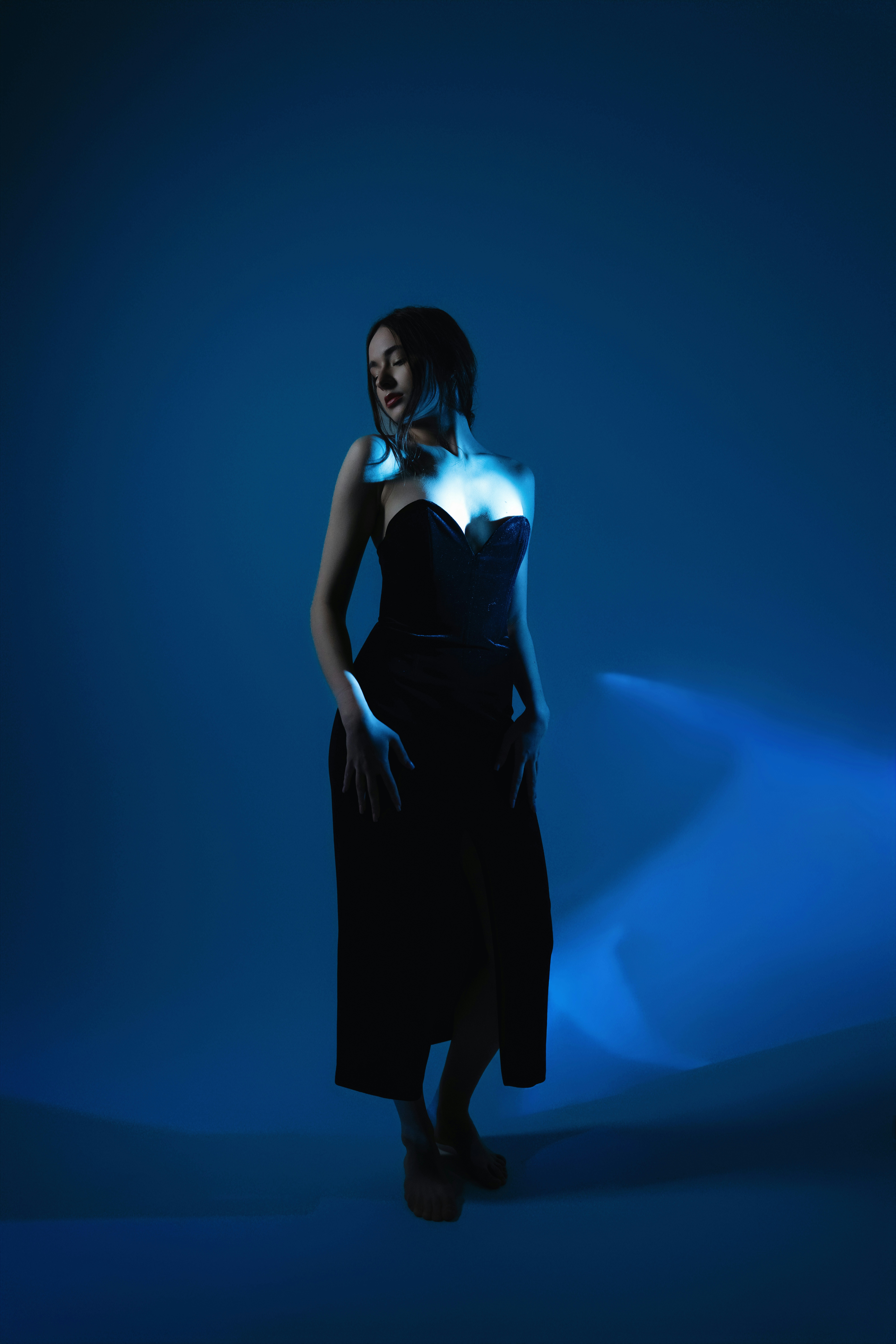 Fashion model in high contrast lighting