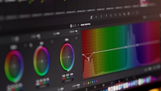 Color grading software is displayed on the screen.
