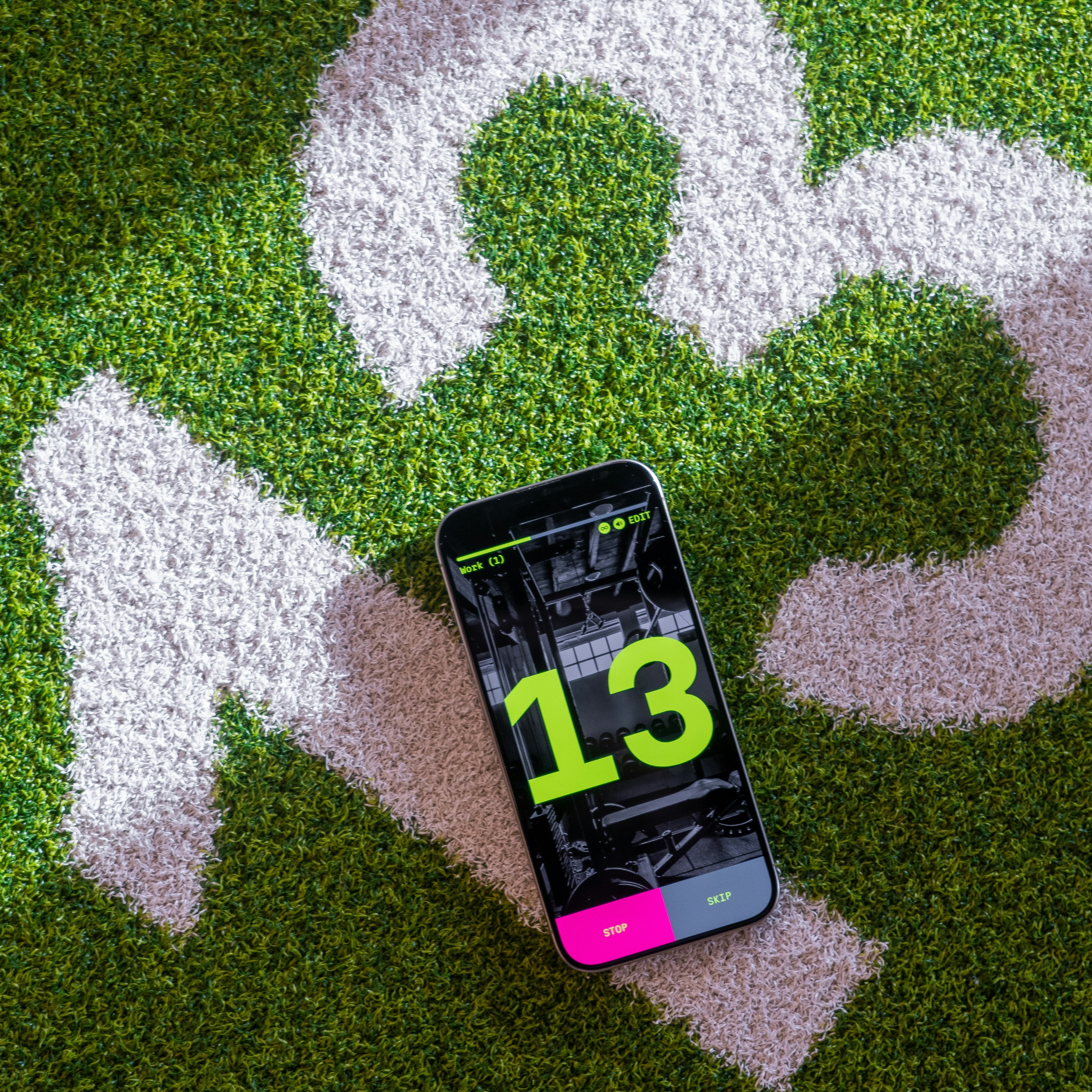A golfer using their phone on the course.