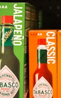 Tabasco sauce bottles on a shelf in a store.