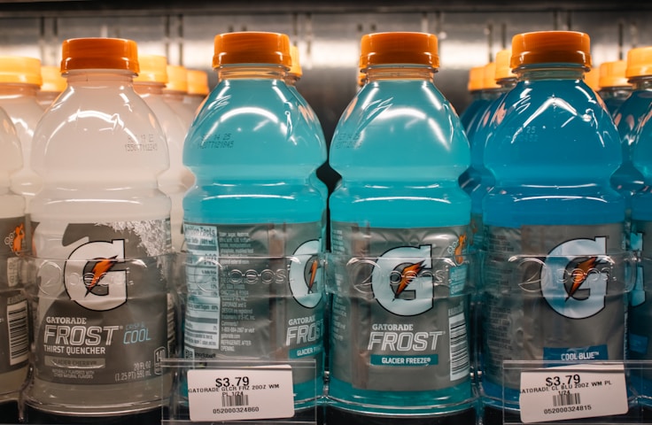 Gatorade frost bottles are displayed in a store.