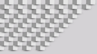 A 3D pattern of white and gray cubes.