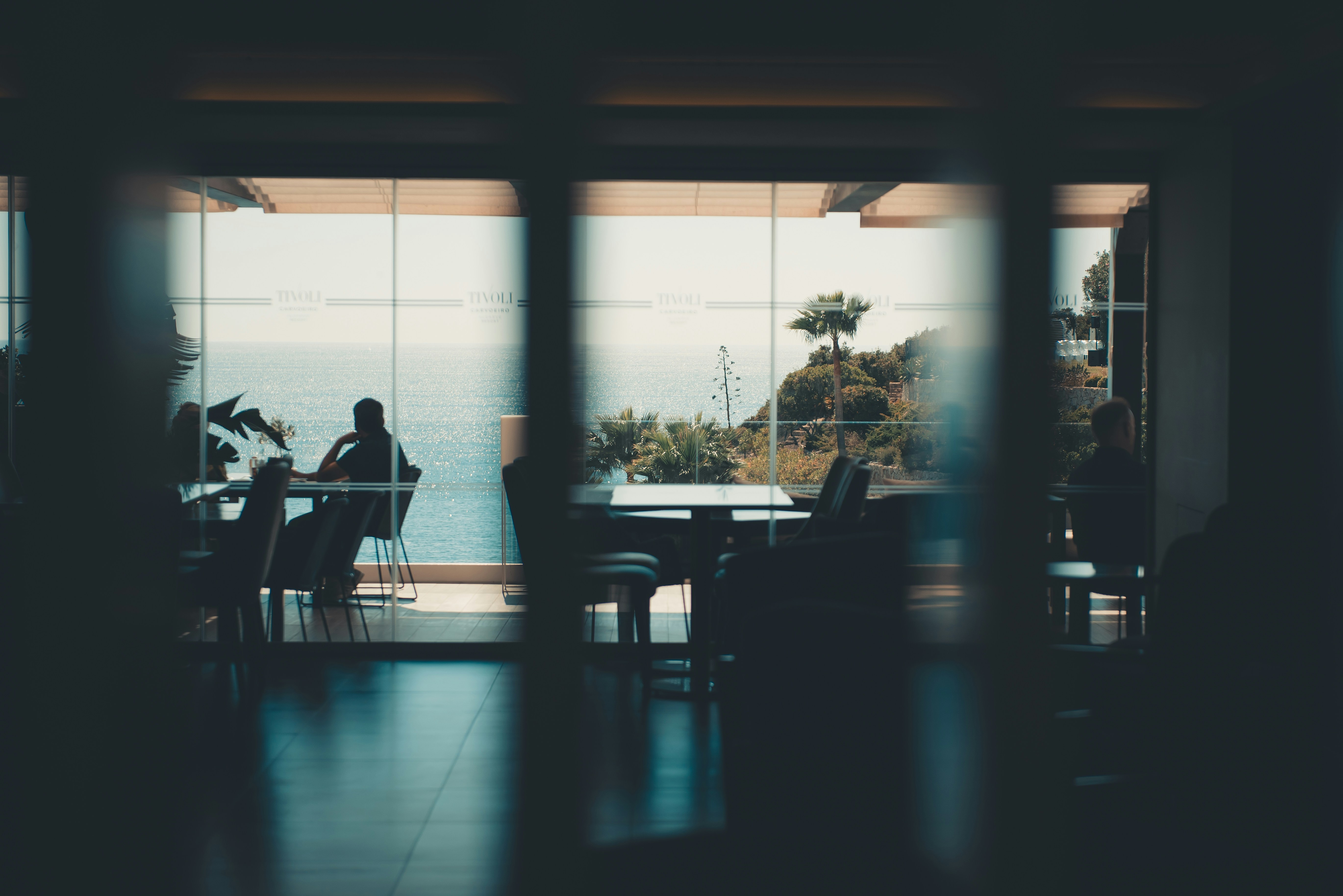 Dining room with a scenic, outdoor ocean view.