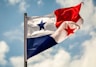 The flag of panama waves in the wind.