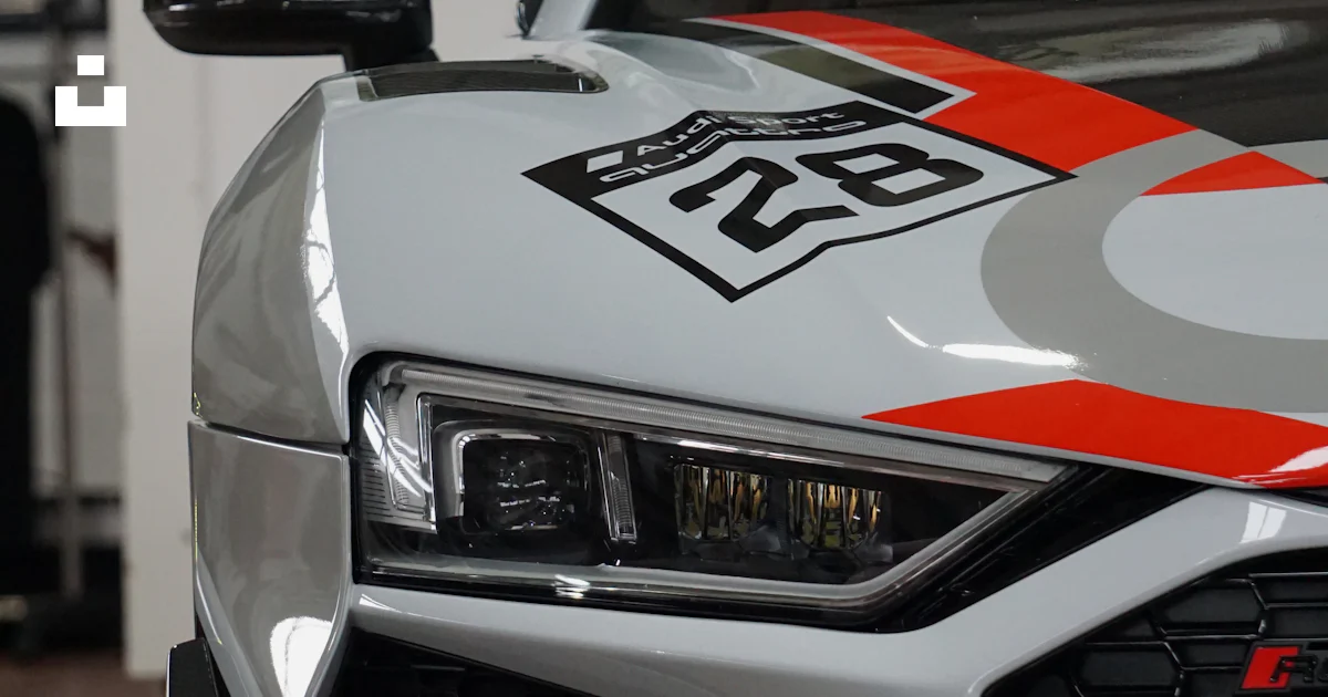 Close-up of a white audi r8 with racing stripes. photo – Free Car Image ...