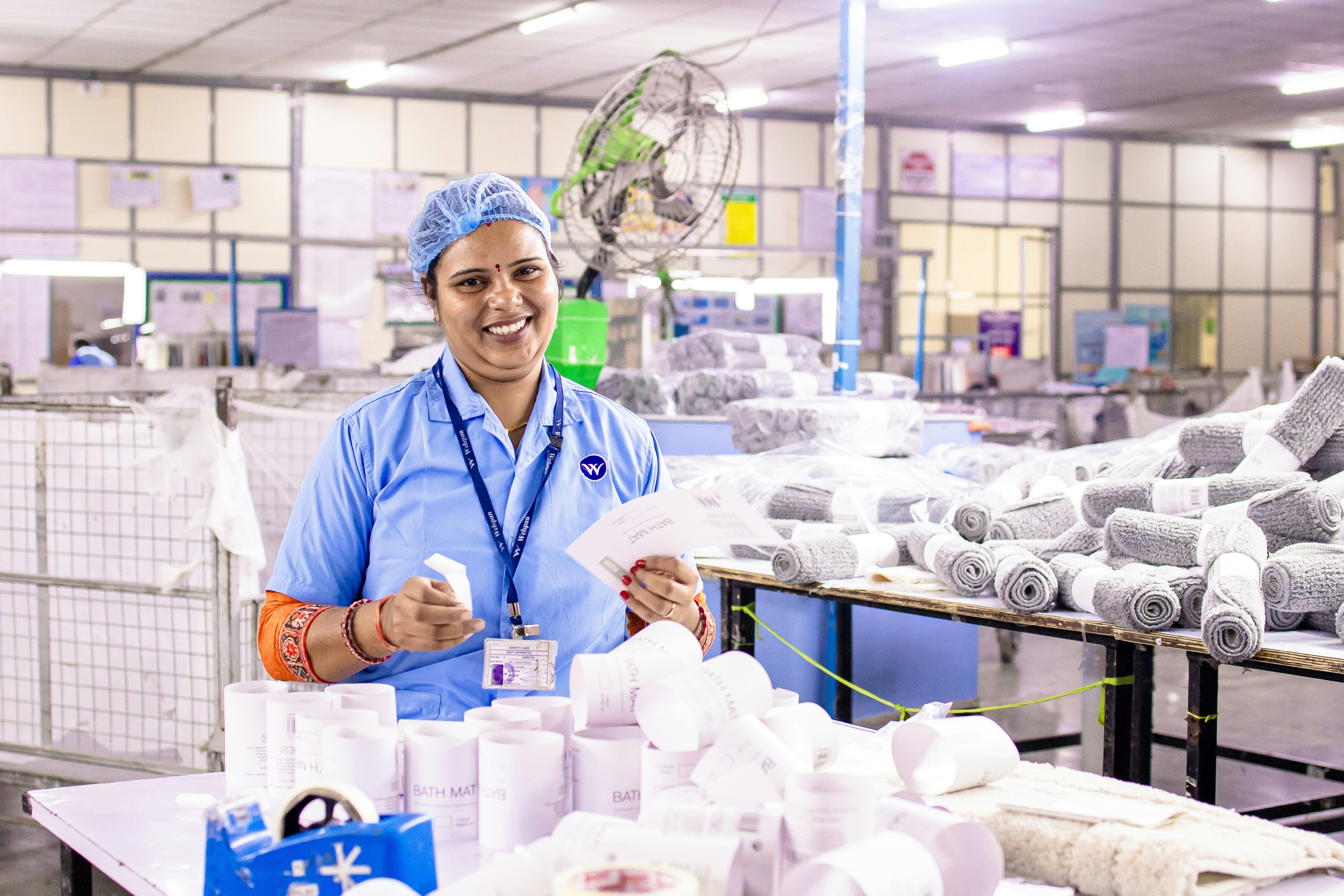 A woman works in a medical products manufacturing facility.