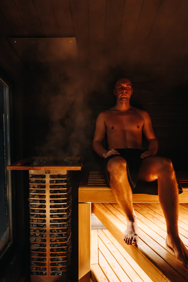 Man relaxing in a steamy infrared sauna