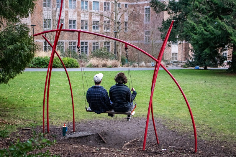 Romantic couple swinging together