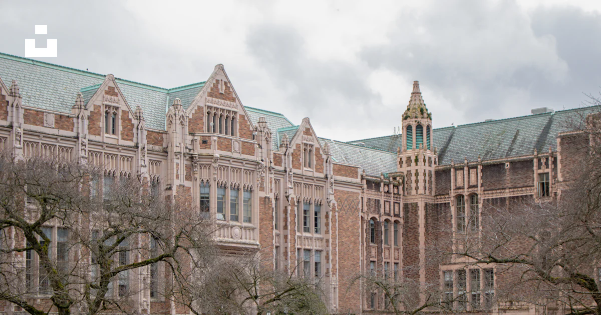 Beautiful collegiate gothic building stands on a campus. photo – Free ...