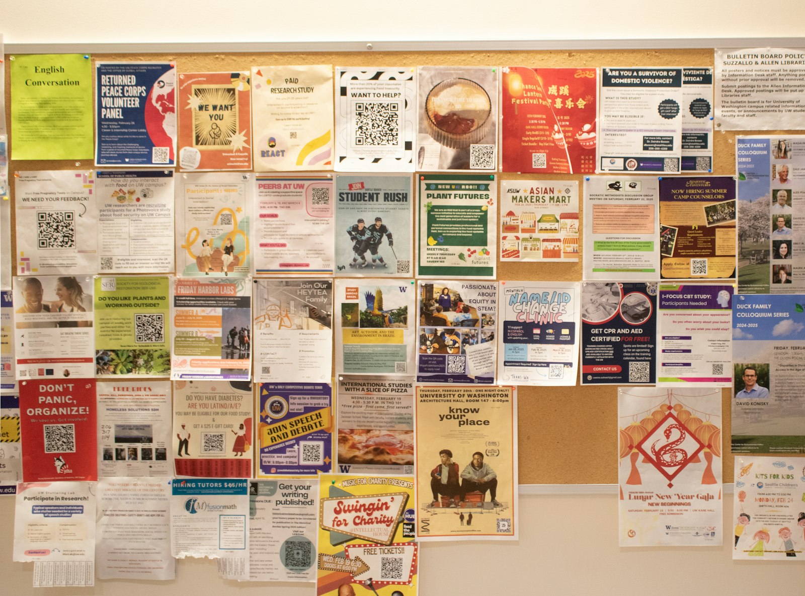Wall covered with printed notices and flyers