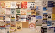 Bulletin board filled with various posters and flyers.