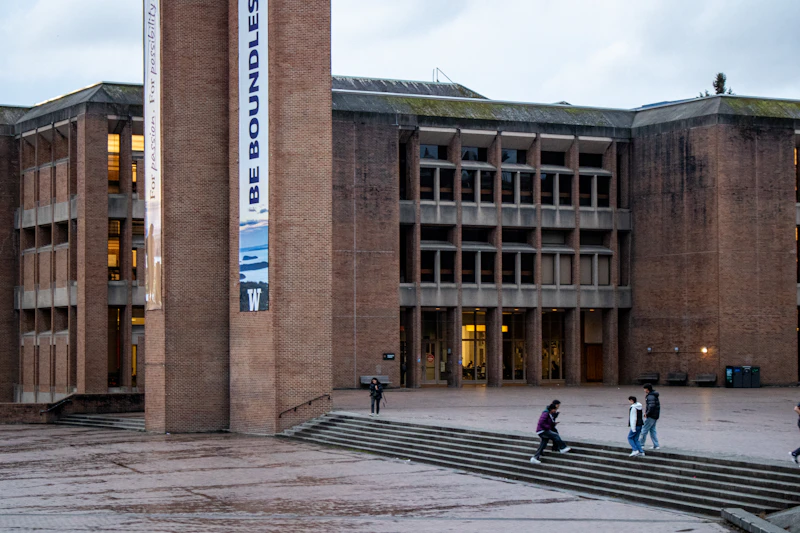 University building with students on steps