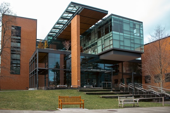 Modern building with glass and brick facade.