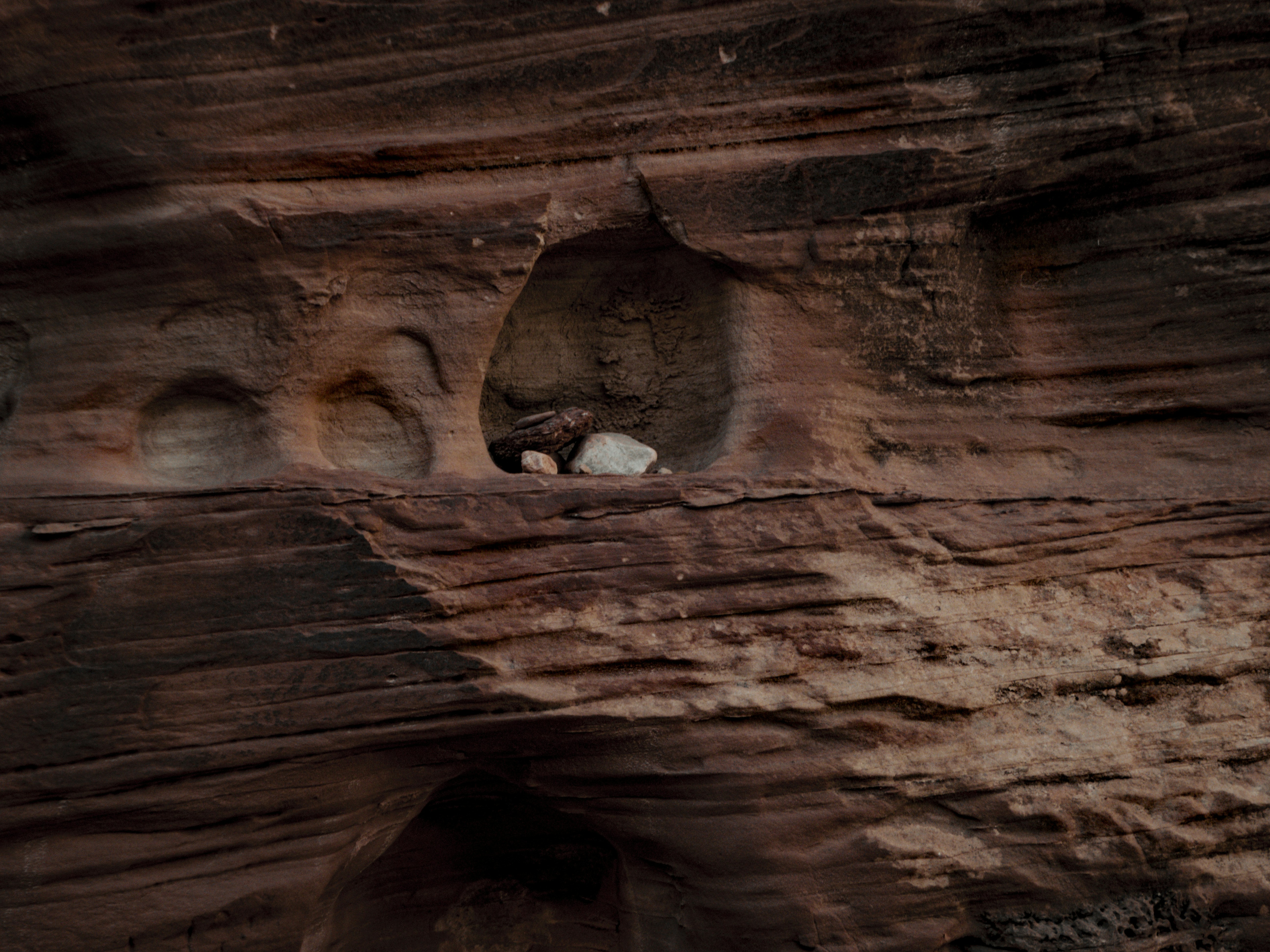 Rock wall with holes.