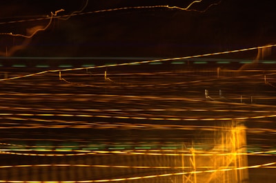 Light trails create an abstract, night cityscape.
