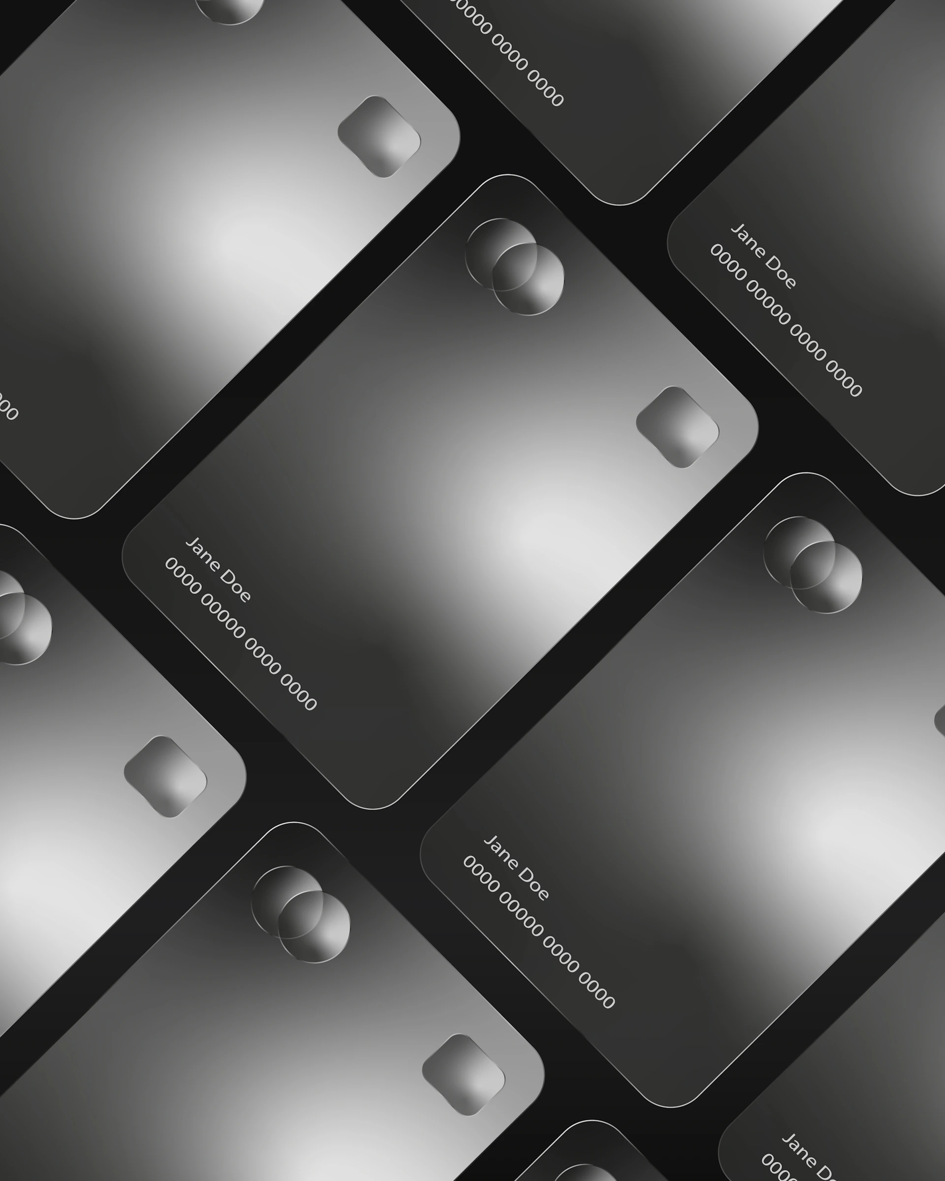 Multiple credit cards arranged in a pattern.