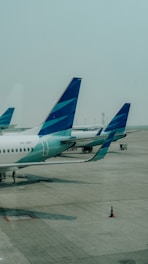 Airplanes parked at the airport terminal.