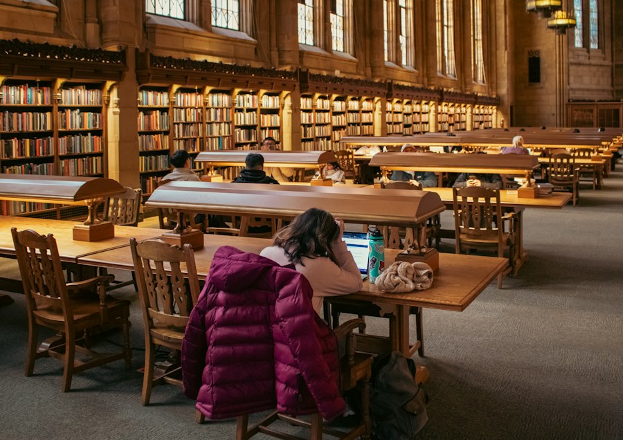 Students studying in a large university library