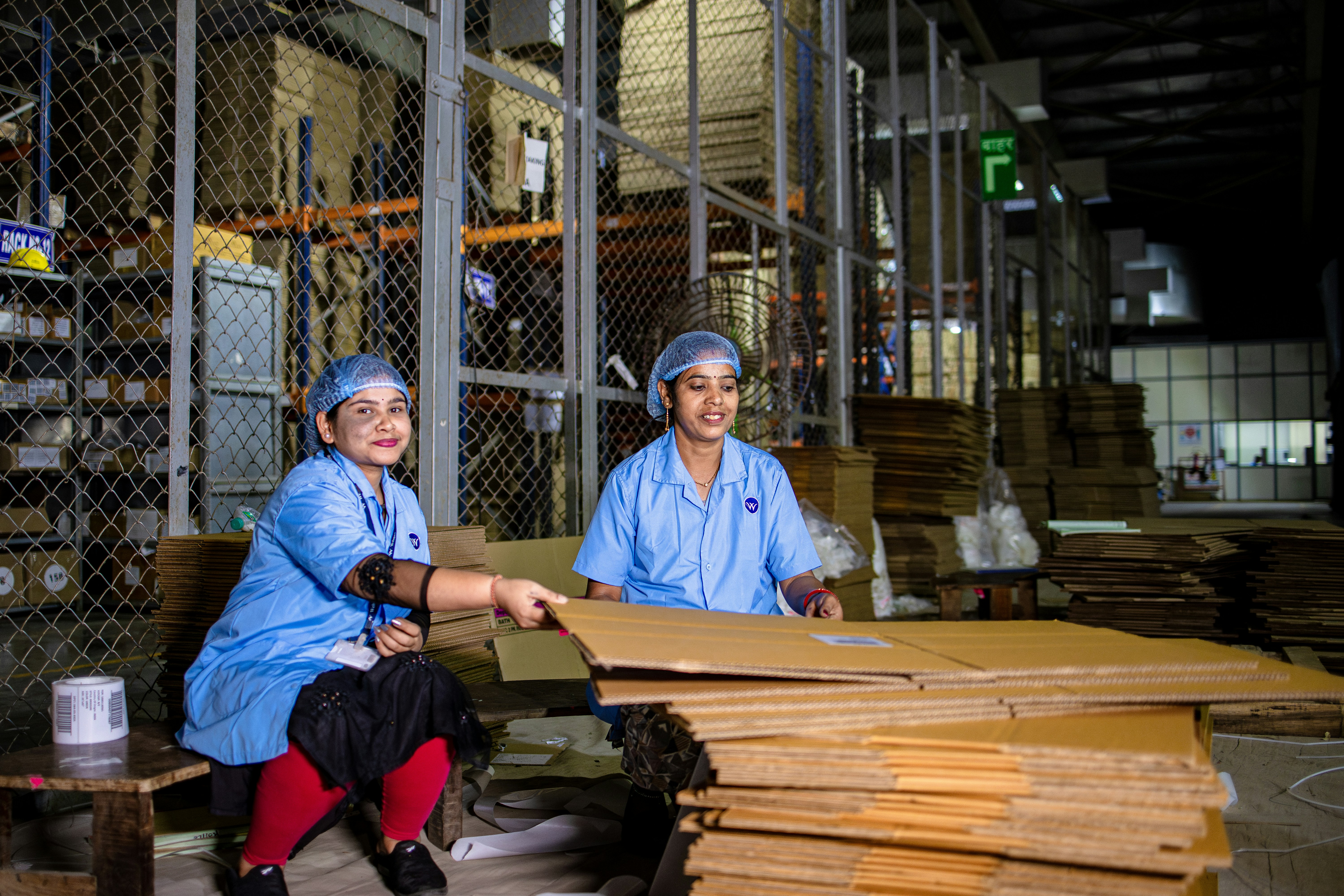 Warehouse team working together to organize inventory and prepare shipments - general labor jobs part time
