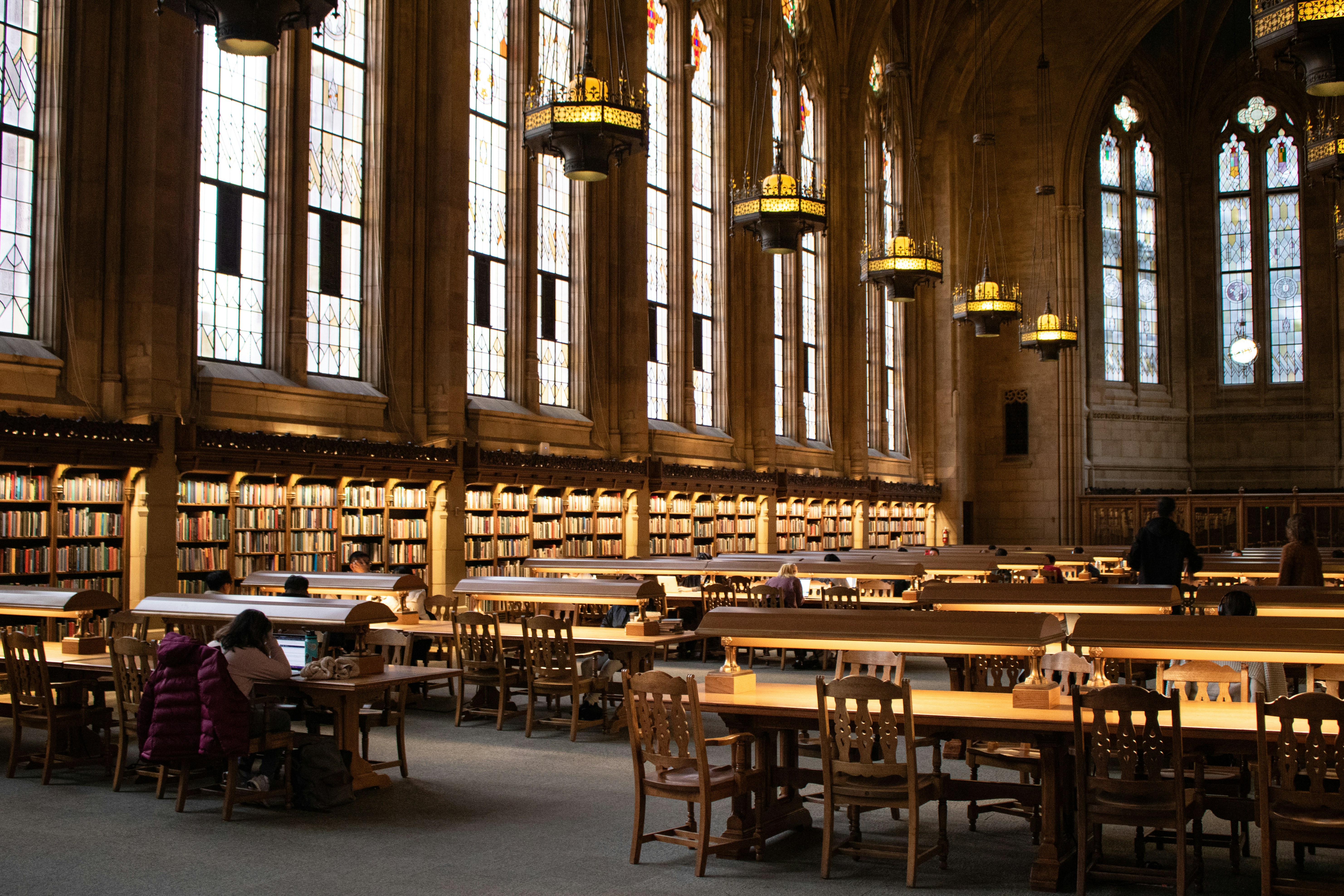 Suzzallo Library, the flagship library of the University of Washington, Seattle, is an architectural masterpiece in the Collegiate Gothic style, completed in 1926. Its Grand Reading Room features towering stained glass windows, vaulted ceilings, and intricate woodwork, creating an awe-inspiring study environment. Named after Henry Suzzallo, former UW president, the library houses millions of volumes, rare manuscripts, and special collections. As the intellectual heart of the university, it serves students, faculty, and researchers, blending history with modern scholarship in one of the most st